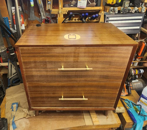 Bedside table with two drawers and built in wireless charging.